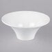 A white fluted melamine pedestal bowl.