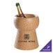 A Franmara customizable cork champagne cooler with a corked bottle of champagne inside.