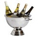 A silver Franmara heavy-duty cooler with three bottles in it.