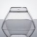 A clear square acrylic bowl with a lid.