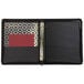 A black leather Samsill Classic Collection zippered ring binder with a red card inside.