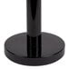 a black round object with a black base