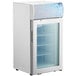 An Avantco white countertop freezer with a glass swing door.