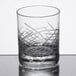 A Reserve by Libbey Crosshatch Rocks glass on a table.