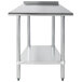 An Advance Tabco stainless steel work table with a shelf.