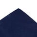 A navy blue cloth with a corner folded over.