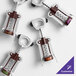 A set of chrome-plated wing corkscrews with burgundy enameled bodies, each featuring a customizable label.