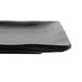 A black rectangular GET Nara melamine platter with a wavy edge.