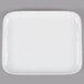 A white rectangular melamine platter with gold specks.