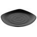 A black square Nara melamine plate with spirals.