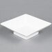 A case of 24 white square porcelain bowls with a square base.