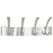 A brushed nickel metal Safco coat rack with four pegs.