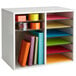 A gray Safco file organizer on a white shelf with colorful papers and folders.