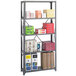 A Safco dark gray metal shelving unit with boxes, cans, and a white box with blue and yellow labels.