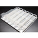 A white plastic Trueflex bottle organizer tray with six plastic trays on it.