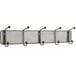 A black metal Safco wall rack with five coat hooks.