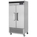 A Turbo Air Super Deluxe solid door reach-in freezer with black handles.