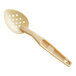 A beige plastic Cambro spoon with holes in it.