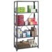 A Safco dark gray metal shelving unit with many boxes stacked on shelves.