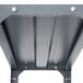 A Safco dark gray steel shelving unit with screws in it.