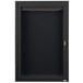 A black metal cabinet with a hinged door and key.