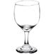 A close-up of a clear Libbey red wine glass.