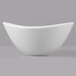 A close-up of a white GET Magnolia melamine bowl with a textured rim.