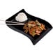 A Fineline black plastic plate with rice and chopsticks on it.