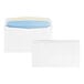 A white business envelope with a gummed seal and blue security tint lining.