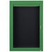 A green cabinet with a black door containing a black letter board.