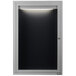 A black rectangular message center with a light on it.