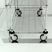 A Metro aluminum floor pad protector set on wheels.