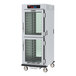 A Metro C5 9 series heated holding and proofing cabinet with clear Dutch doors.