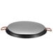 A Matfer Bourgeat carbon steel paella pan with red handles.