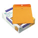 A box of orange Quality Park #97 file envelopes with a clasp.