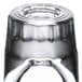 A close up of a Libbey fluted shot glass with a white background.