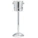 A silver Vollrath wine bucket on a metal stand.