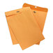 A group of orange Quality Park clasp envelopes with a string attached.