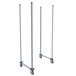 A pair of stainless steel MetroMax poles with wheels on them.