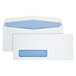 Two white Quality Park business envelopes with blue security tint and a window.