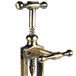 A Franmara Rack & Pinion corkscrew with a metal handle opening a wine bottle.