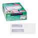 A white box of Quality Park white check envelopes with windows and self-adhesive seal.