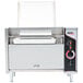 An APW Wyott vertical conveyor bun grill toaster with the lid open.