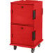 A red Cambro Ultra Camcart for food pans with heavy-duty casters.