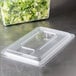a clear plastic container with a clear plastic lid
