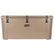 A tan Grizzly Cooler with black handles.
