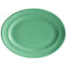 A green oval platter with a white rim.