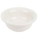 A Hall China pot pie baking bowl in white ceramic with a handle.