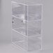A clear plastic Cal-Mil bread box with three sections.