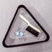 A brush and black triangle on a Mizerak pool table.